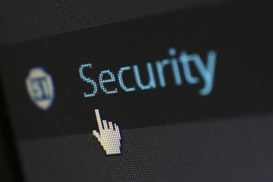The word security in blue on a black screen