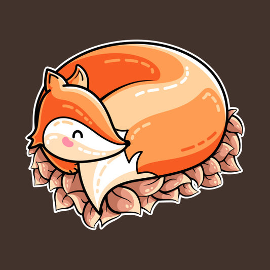 A cute fox curled on a pile of autumn leaves