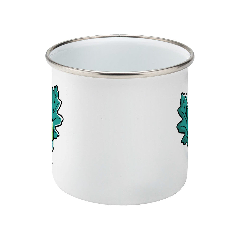 Cute acorn and oak leaves design on a silver rimmed white enamel mug, showing side