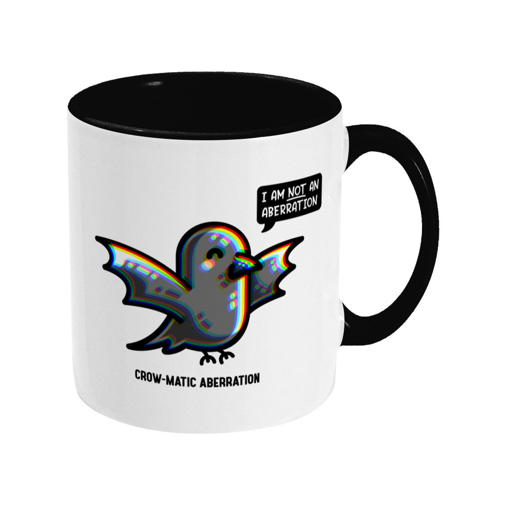 A two toned white and black ceramic mug, handle to the right, featuring a kawaii cute crow with chromatic aberration. A speech bubble says I am NOT an aberration.