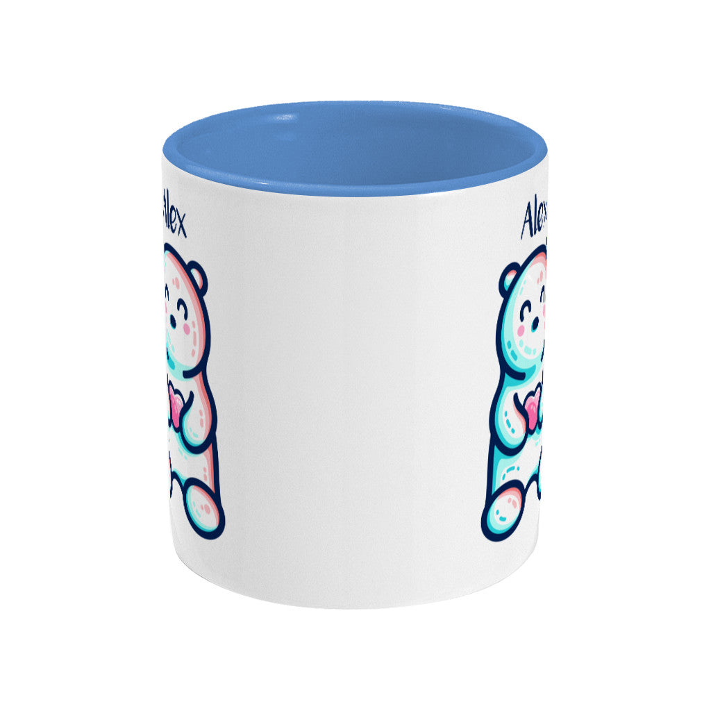 A blue two toned ceramic mug with the name Alex and a polar bear design beneath - side view