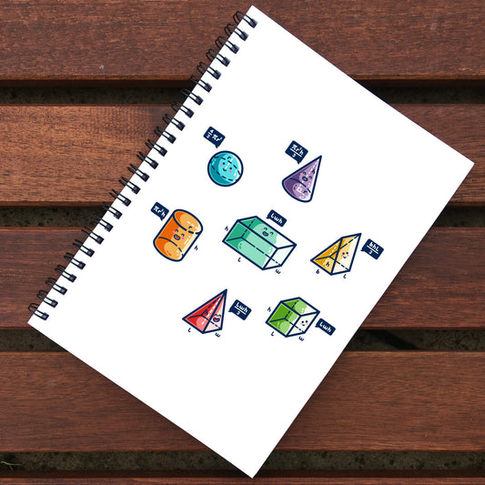 White spiral bound notebook lying on wooden slats. The center of the front cover shows a honeycomb arrangement of 7 colourful 3D shapes, one of them in the middle, with happy faces and dark blue speech bubbles stating the maths to work out the volume of the shape.