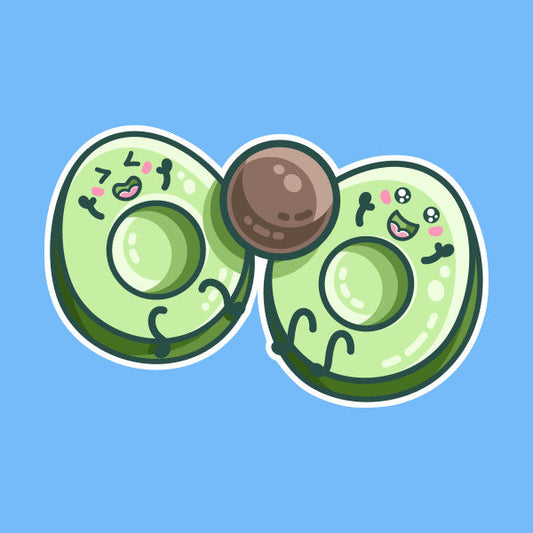 Kawaii cute avocado halves playing catch with their stone