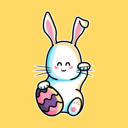 Cute lucky rabbit with its paw up and an Easter egg