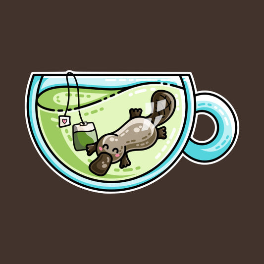 Platypus swimming in a glass teacup of green tea