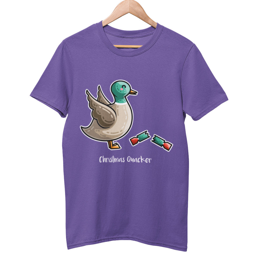 A purple unisex crewneck t-shirt on a hanger with a design on its chest of a kawaii cute mallard duck with its wings out looking slightly alarmed and a Christmas cracker in half at its feet with the words Christmas Quacker in white beneath
