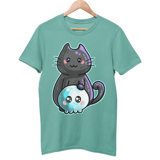 A green unisex crewneck t-shirt on a wooden hanger with a design on its chest of a cute black cat with its paw resting on a kawaii cute skull in front of it, all bordered with a pale turquoise coloured line
