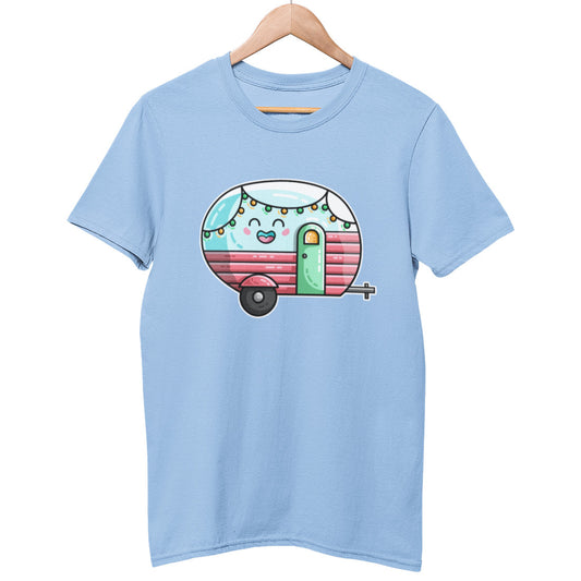 A pale sky blue unisex crewneck t-shirt on a hanger with a design on its chest of a kawaii cute blue vintage style caravan seen side on with the tow bar to the right and with a green door and pink panelling on the bottom half of the caravan and a string of coloured lights looping across the top