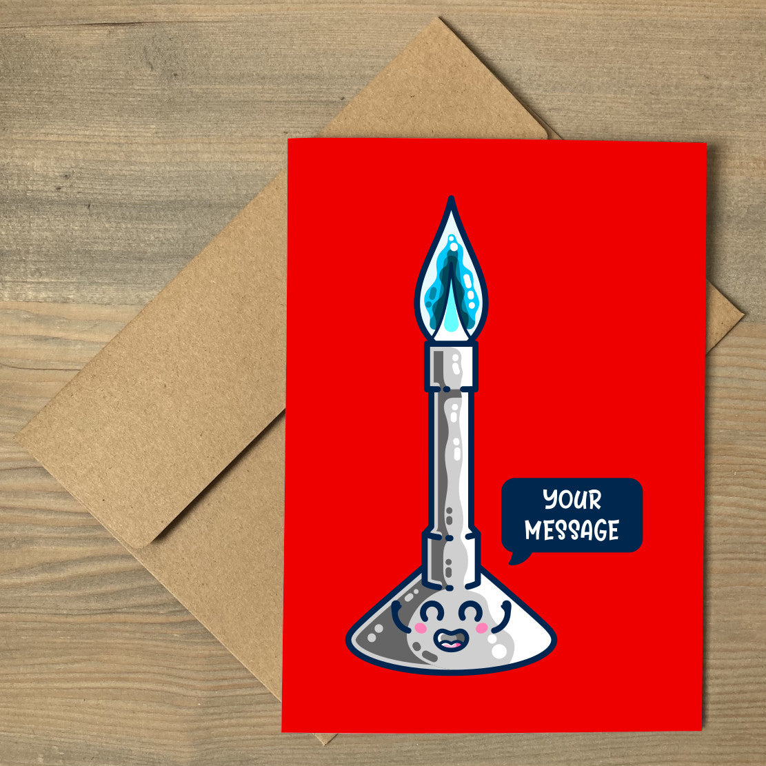 A brown envelope beneath a red greeting card that features a kawaii cute bunsen burner lit with a blue flame and a speech bubble with your own personalised message inside