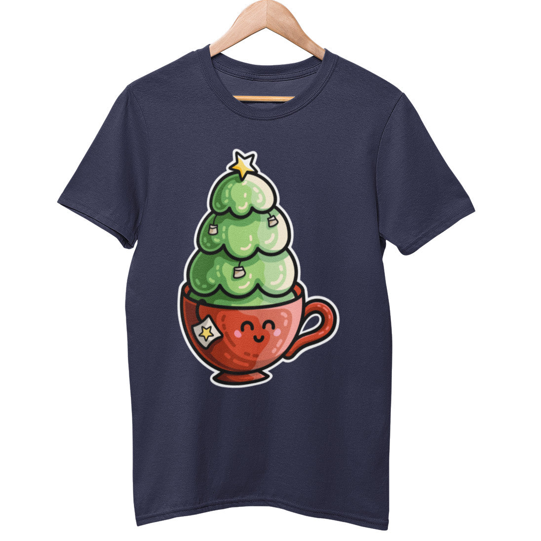 A navy colour unisex crewneck t-shirt on a wooden hanger with a design on its chest of a kawaii cute style red tea cup with a Christmas tree planted in it with teabags decorating the tree instead of baubles