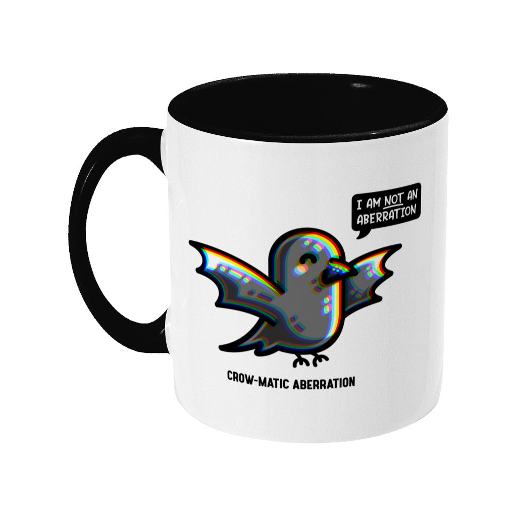 A two toned white and black ceramic mug, handle to the left, featuring a kawaii cute crow with chromatic aberration. A speech bubble says I am NOT an aberration.