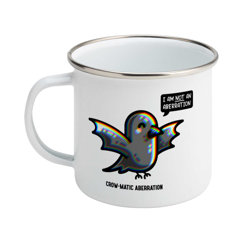 A silver rimmed white enamel mug, handle to the left, featuring a kawaii cute crow with chromatic aberration. A speech bubble says I am NOT an aberration.