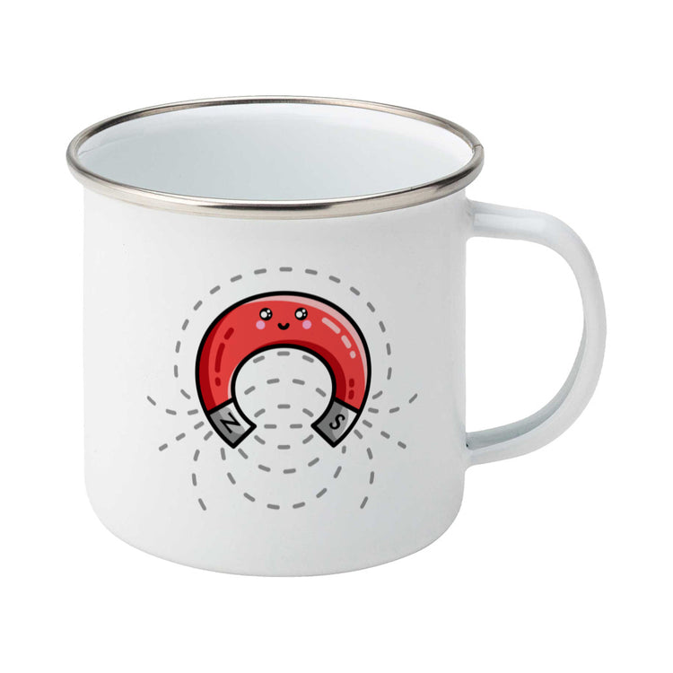 A silver rimmed white enamel mug with the handle to the right and a design of a cute red magnet with magnetic field lines.
