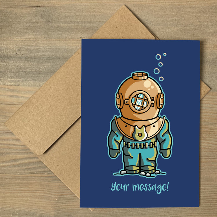 A personalised greeting card lying flat on a brown envelope, with a design of a vintage deep sea diver on a dark blue background