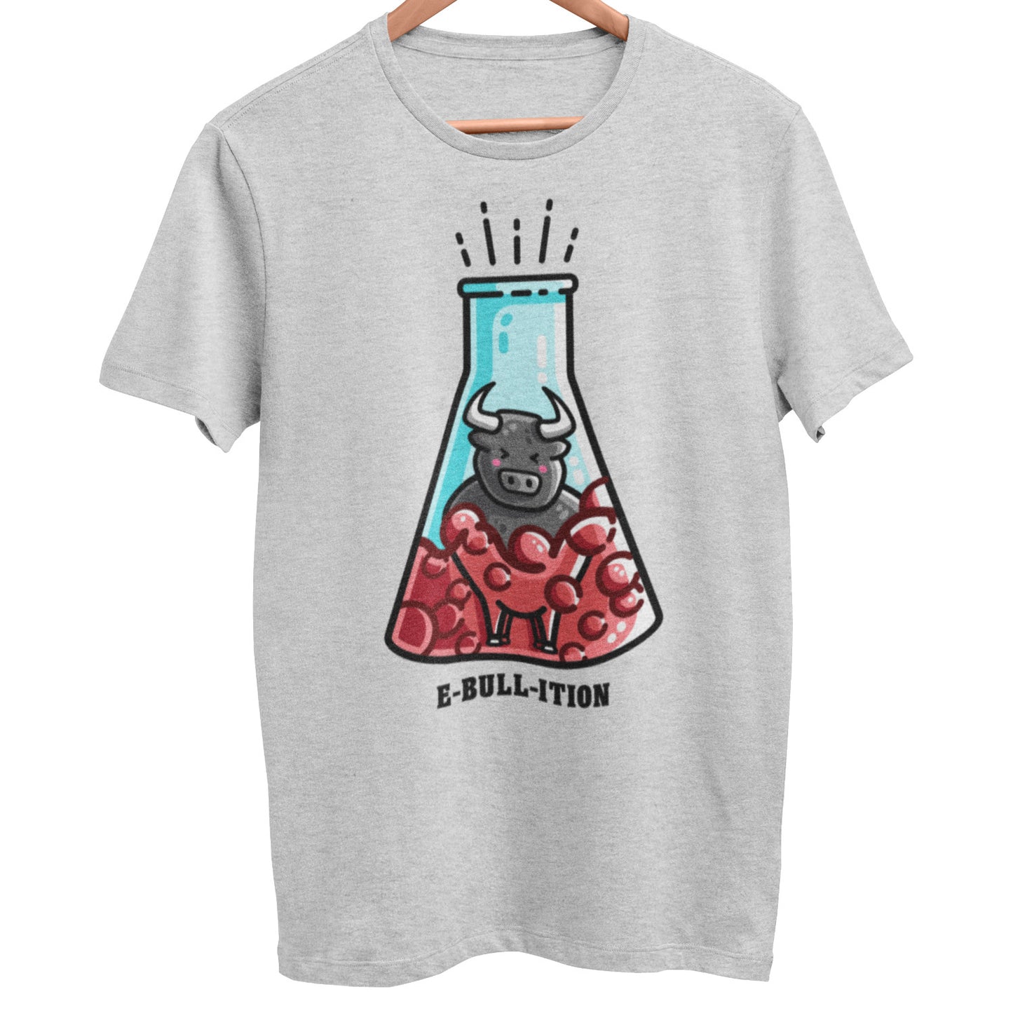 A sports grey unisex crewneck t-shirt on a hanger with a design on the front of a kawaii cute bull in a boiling flask of red liquid with 'e-bull-ition' written beneath.