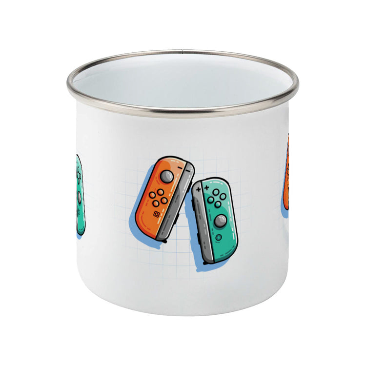 An orange and a turquoise game controller design on a silver rimmed enamel mug, side view
