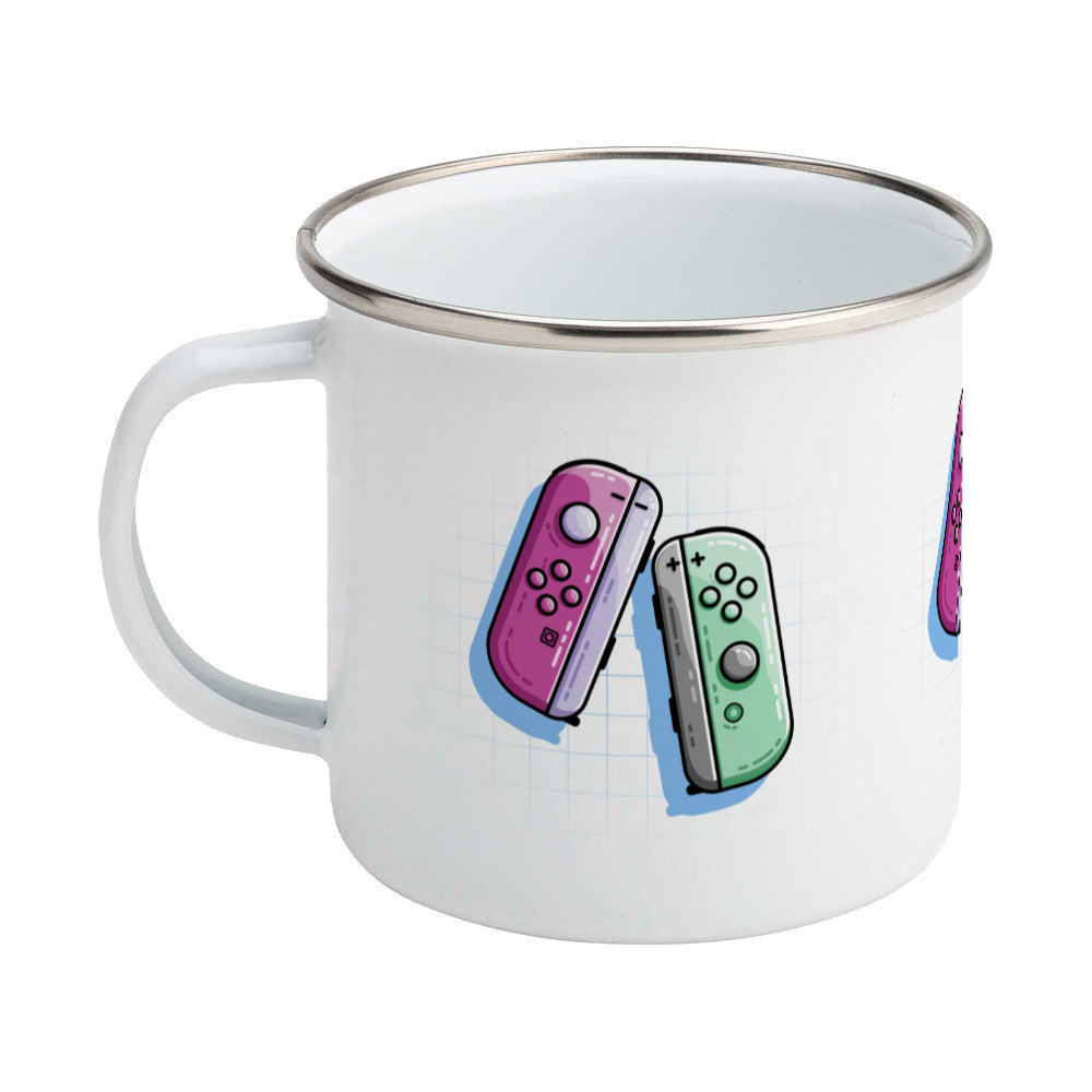 A pink and a green game controller design on a silver rimmed enamel mug, showing LHS