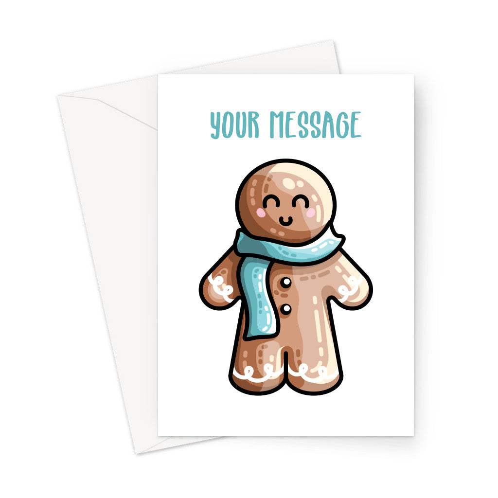 A white envelope beneath a white greeting card with a design of a kawaii cute gingerbread person wearing a blue scarf