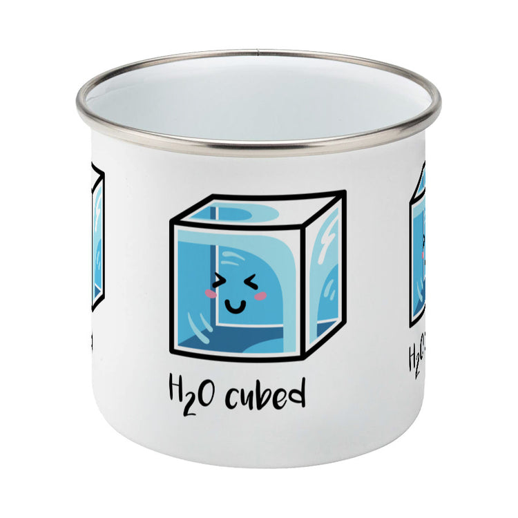 Kawaii cute blue cube of ice with the words 'H20 cubed' design on a silver rimmed white enamel mug, middle view
