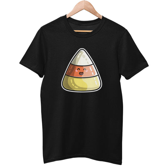 A black unisex crewneck t-shirt on a wooden hanger with a design on its chest of a smiley faced striped candy corn in white, orange and yellow and with a white outer border line