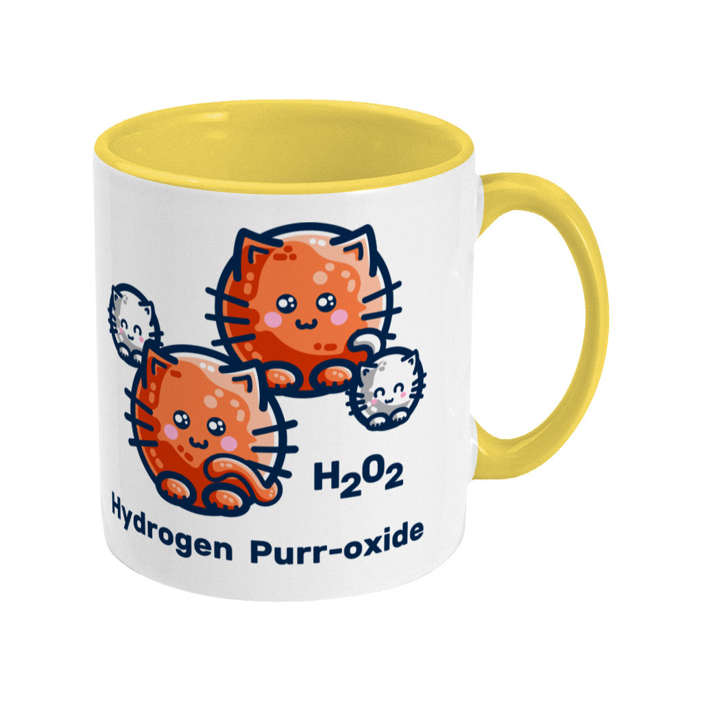 A two toned white and yellow ceramic mug with the handle to the right showing a design of a hydrogen molecule with the hydrogen atoms replaced by round white kittens and the oxygen atoms replaced by larger round ginger cats and the words H202 hydrogen purr-oxide