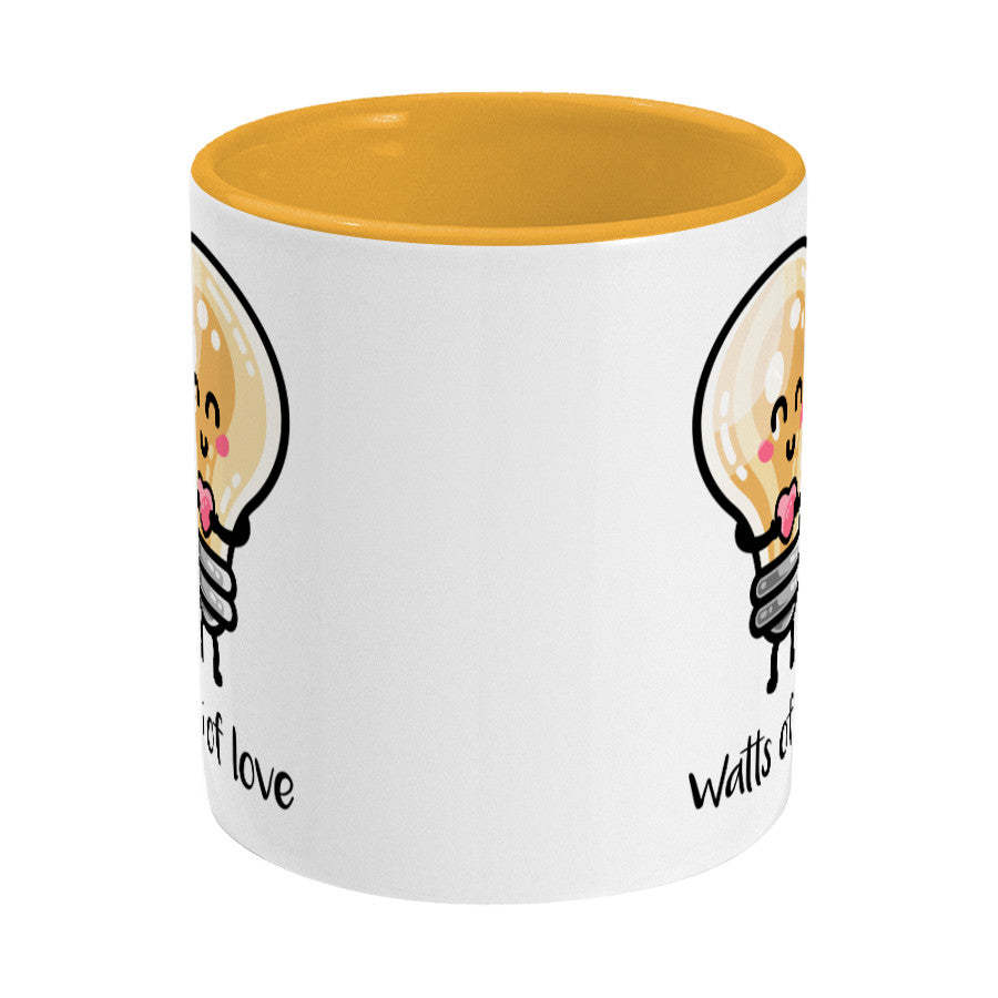 Kawaii cute lightbulb holding a heart design on a two toned yellow and white ceramic mug, side view