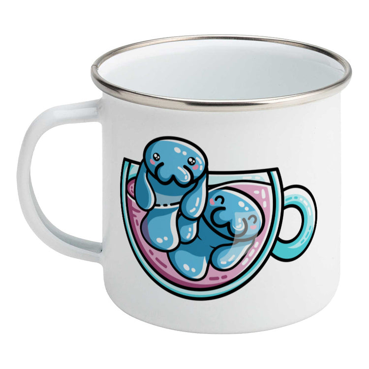 Two kawaii cute blue manatee swimming in a glass teacup design on a silver rimmed white enamel mug, showing LHS