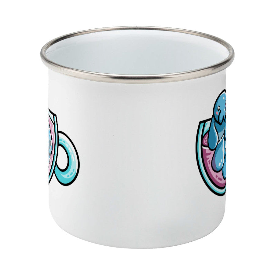 Two kawaii cute blue manatee swimming in a glass teacup design on a silver rimmed white enamel mug, side view