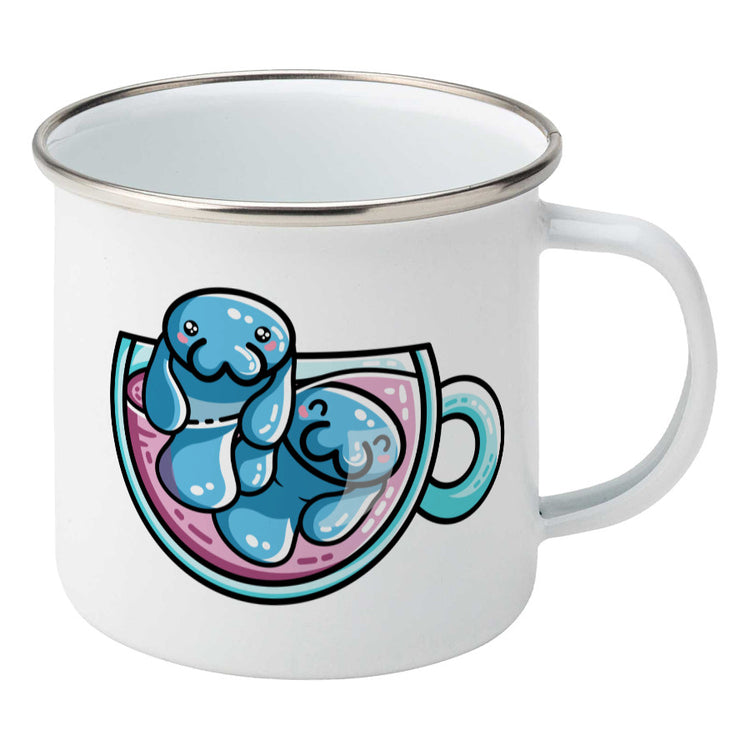 Two kawaii cute blue manatee swimming in a glass teacup design on a silver rimmed white enamel mug, showing RHS