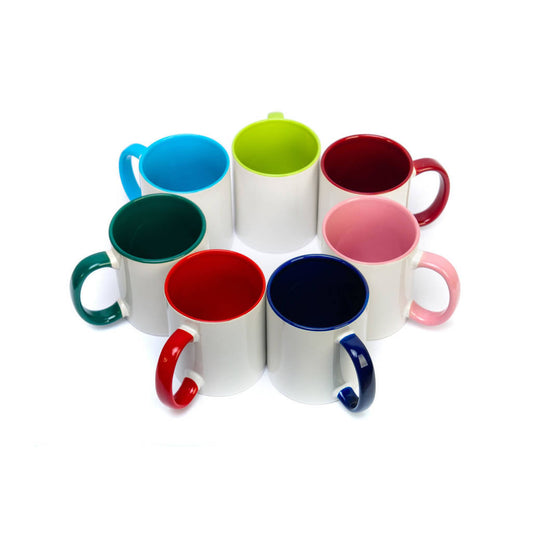 A circle of white ceramic mugs showing the different colours available for the handle and inside