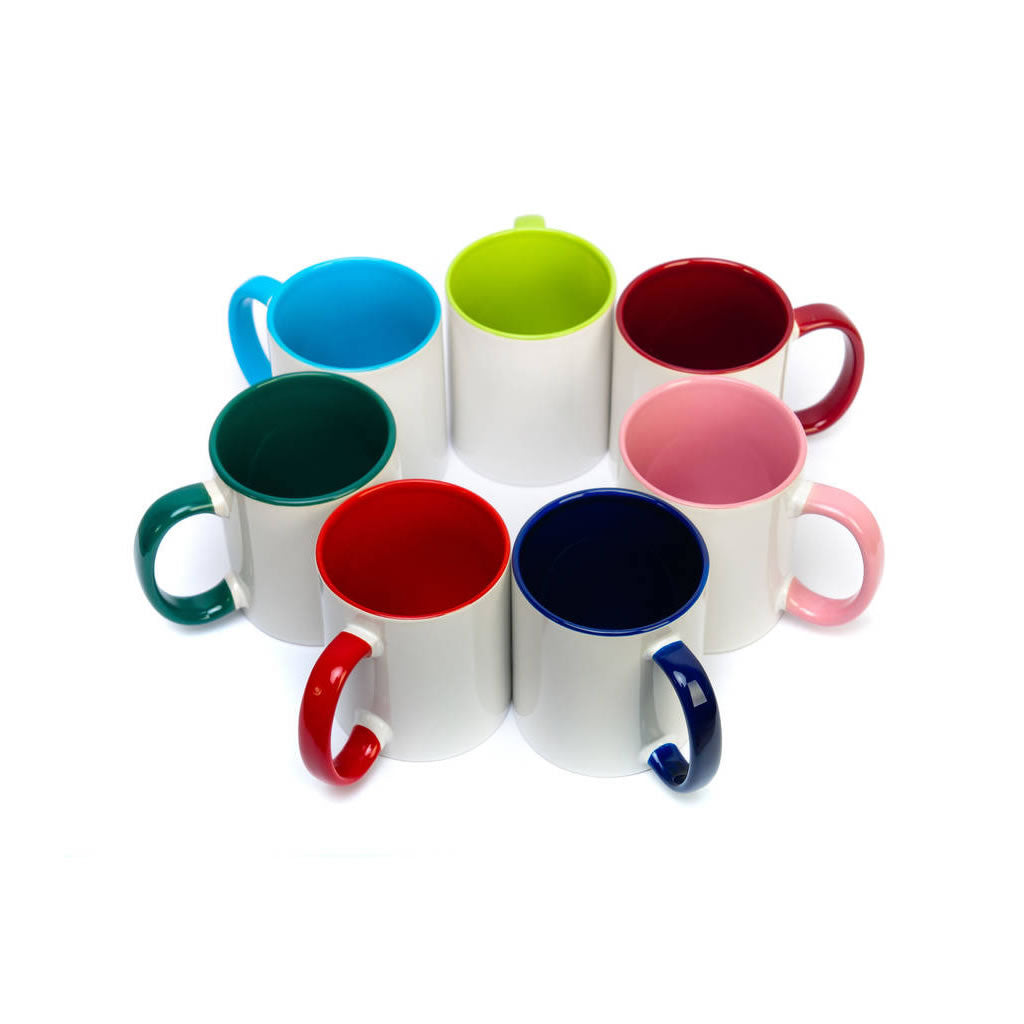 A circle of white ceramic mugs showing the different colours available for the handle and inside