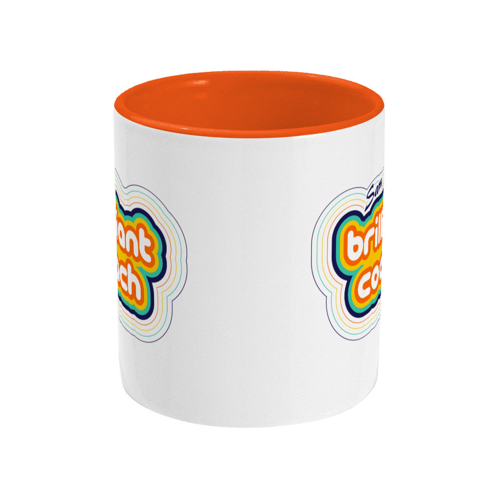 Personalised stripey brilliant coach design on a two toned orange and white ceramic mug, side view