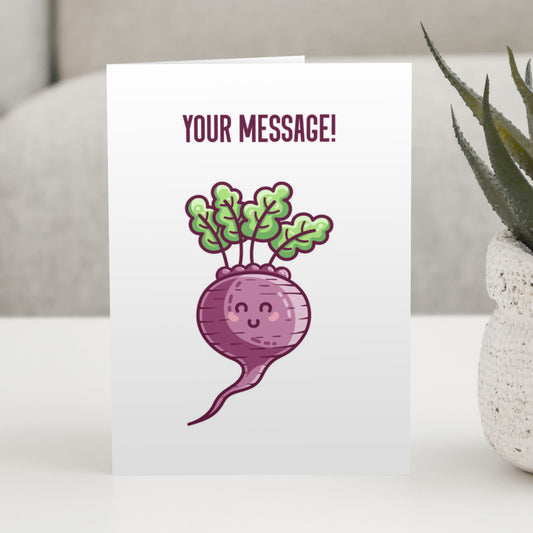 A white greeting card standing on a white table, with a design of a kawaii cute leafy beetroot and your personalised wording above