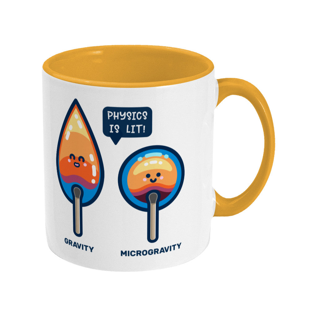 A yellow and white two toned ceramic mug with the handle to the right and a design of two cute flames, one pointed with the word gravity and one circular with the word microgravity and a speech bubble saying physics is lit