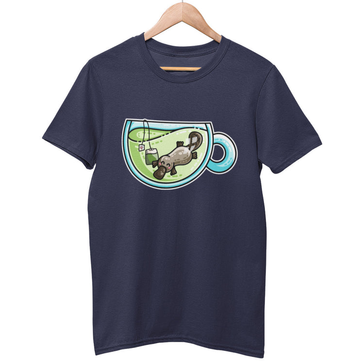 A navy blue colour unisex crewneck t-shirt on a hanger with a design on its chest of a cute platypus swimming in a glass teacup of green tea