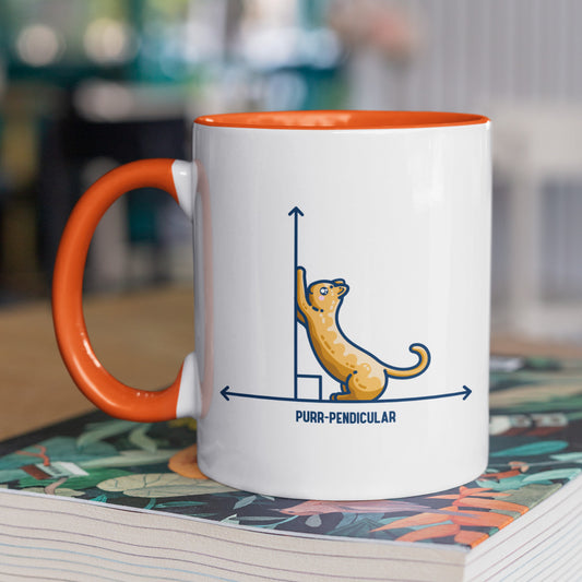 A white ceramic mug with an orange handle and inside, handle to the left. Features a design of a horizontal line intersected by a vertical line at a right angle. A cute ginger cat on the horizontal line is using the vertical line as a scratching post. The word purr-pendicular is written in capital letters beneath.