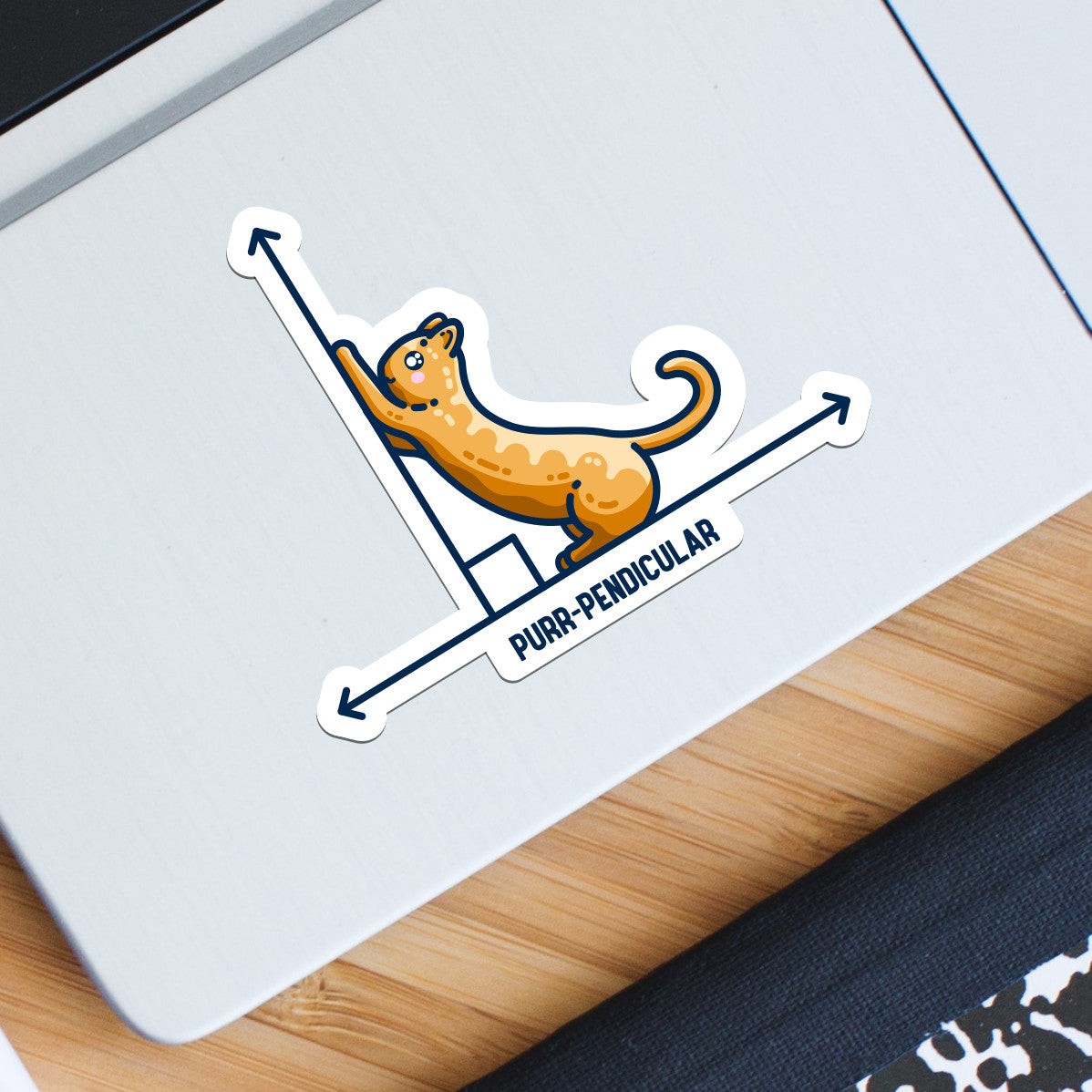 A white vinyl sticker featuring the design of a horizontal line intersected by a vertical line at a right angle. A cute ginger cat on the horizontal line is using the vertical line as a scratching post. The word purr-pendicular is written in capital letters beneath. The sticker is the shape of the design, forming a thick white border around it.