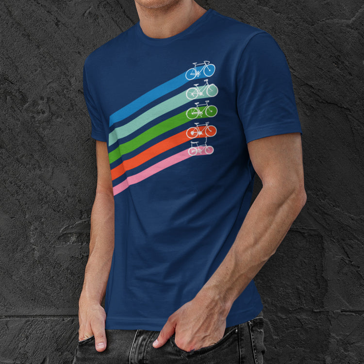 Man wearing a navy cotton crewneck t-shirt of five retro coloured diagonal stripes leading to different styles of bikes
