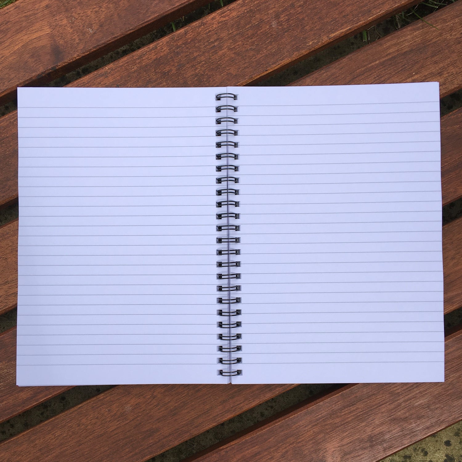 Open notebook showing the inside lined pages