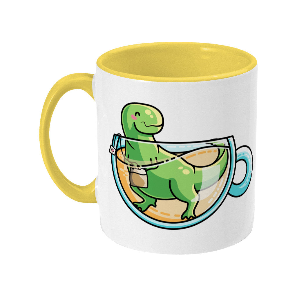 Green tyrannosaurus rex dinosaur in a glass teacup design on a two toned yellow and white ceramic mug, showing LHS
