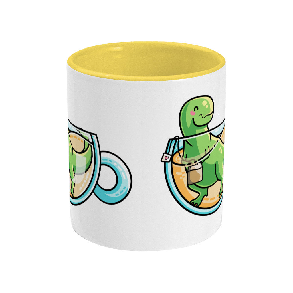 Green tyrannosaurus rex dinosaur in a glass teacup design on a two toned yellow and white ceramic mug, side view