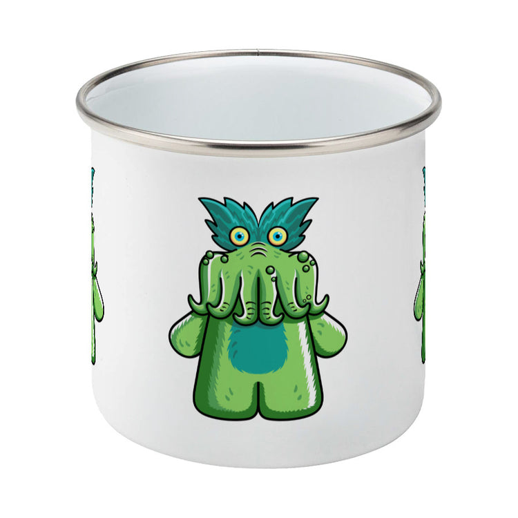 StarKid tickle-me-wiggly plush toy on a silver rimmed white enamel mug, side view