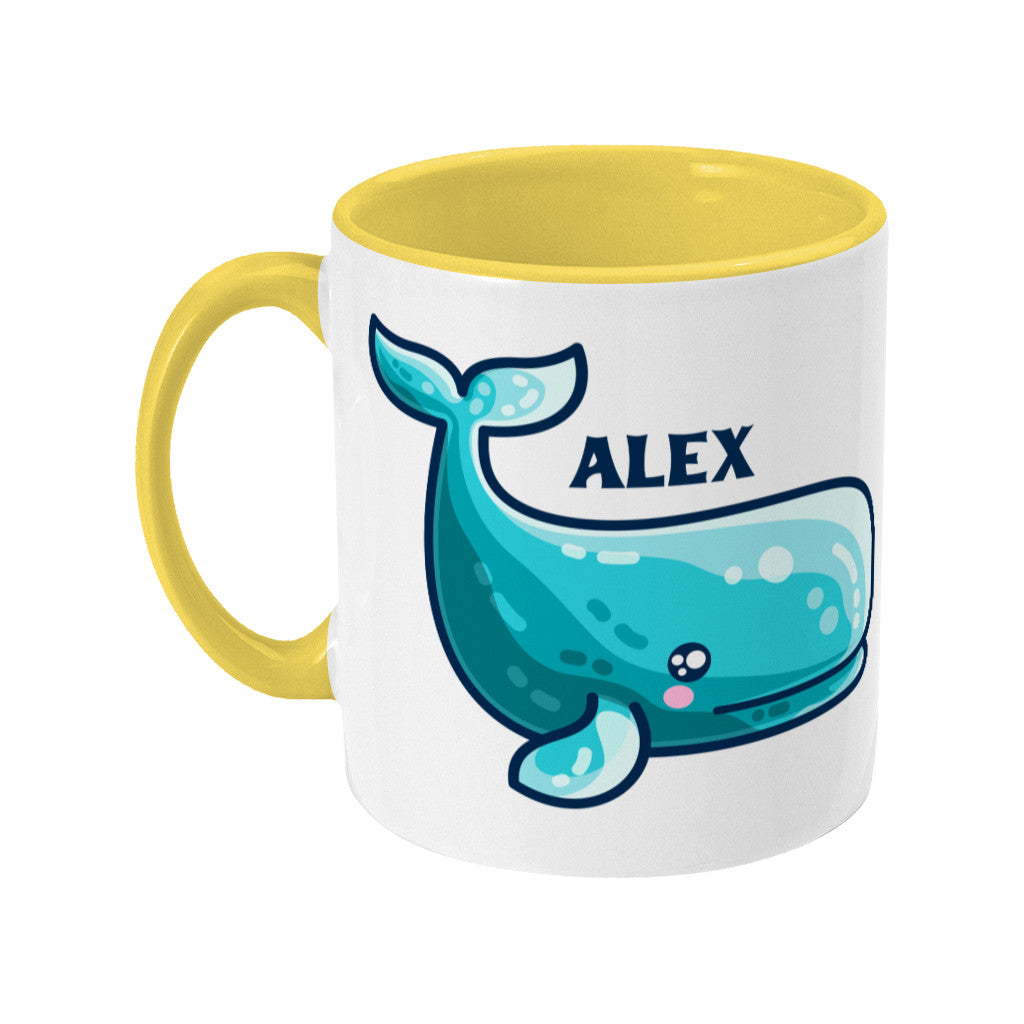 a cute sperm whale design shown on a white ceramic mug with a yellow handle on the left and personalised with the name Alex